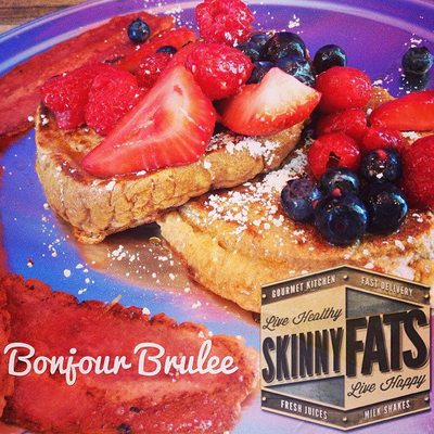 Bonjour Brulee - 9 grain bread dipped in our egg white signature creme brulee mixture, pan fried, fresh berries and drizzled with agave nectar. (Healthy Breakfast)