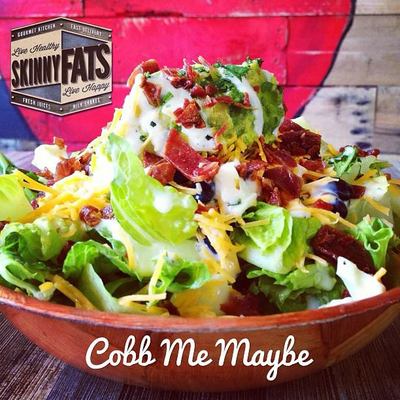 Cobb Me Maybe - Chopped romaine with fajita peppers, 
onions, boiled egg whites, turkey bacon, avocado and 
black beans with fat free cilantro ranch dressing.  
(Healthy Salad) 